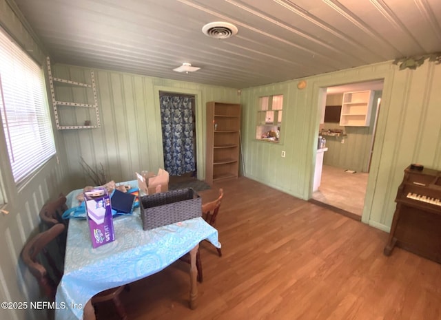 interior space featuring visible vents and wood finished floors