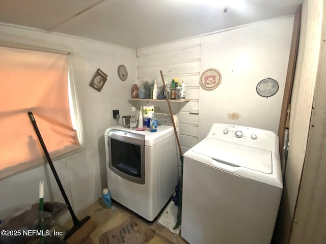 laundry area featuring laundry area and washer and dryer