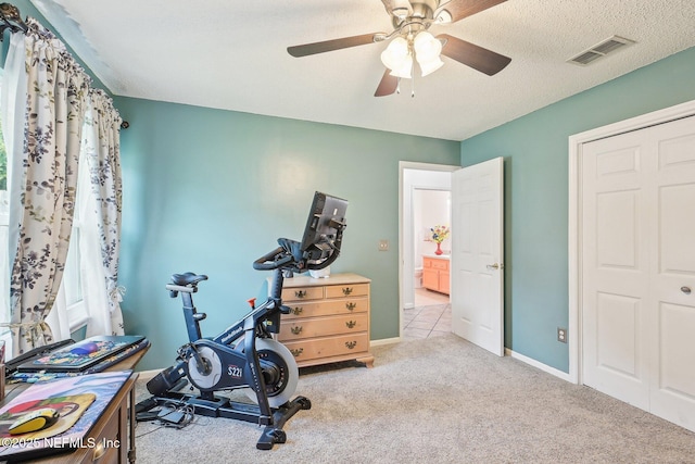 4518 Mountain Brook Ln E, Jacksonville, FL 32224 - exercise room with carpet and ceiling fan