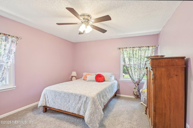 4518 Mountain Brook Ln E, Jacksonville, FL 32224 - carpeted bedroom featuring a ceiling fan and a textured ceiling