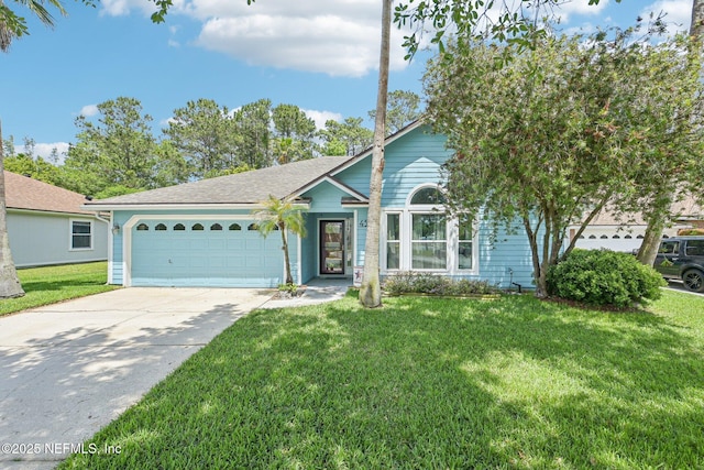 4518 Mountain Brook Ln E, Jacksonville, FL 32224 - ranch-style house with a garage, driveway, a front lawn, and a shingled roof