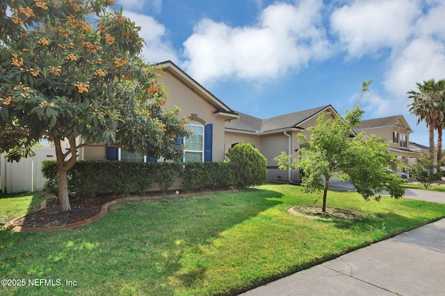 11459 Glenlaurel Oaks Cir, Jacksonville, FL 32257 - single story home with stucco siding, fence, and a front lawn