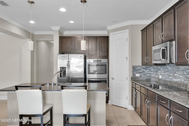 11459 Glenlaurel Oaks Cir, Jacksonville, FL 32257 - kitchen featuring a sink, dark brown cabinetry, visible vents, and appliances with stainless steel finishes