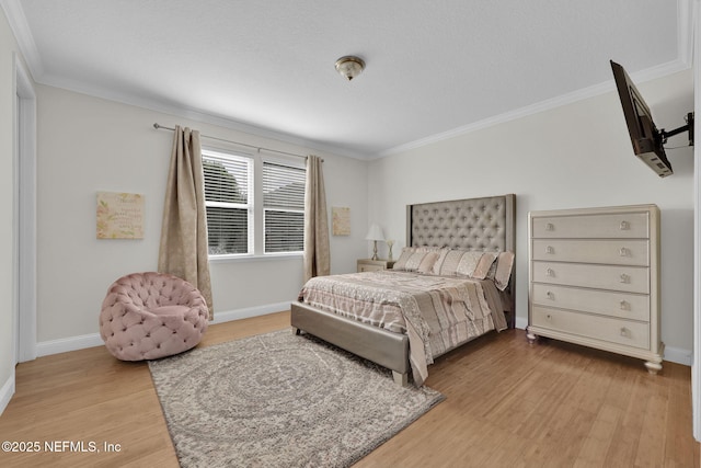 11459 Glenlaurel Oaks Cir, Jacksonville, FL 32257 - bedroom featuring ornamental molding, light wood finished floors, and baseboards