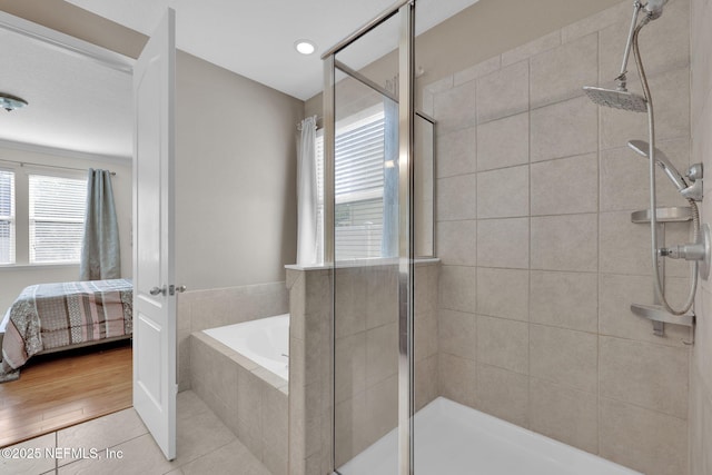 11459 Glenlaurel Oaks Cir, Jacksonville, FL 32257 - bathroom with a bath, a stall shower, and ensuite bathroom