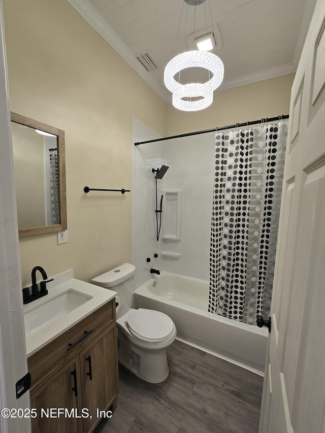 bathroom featuring ornamental molding, visible vents, a chandelier, and wood finished floors