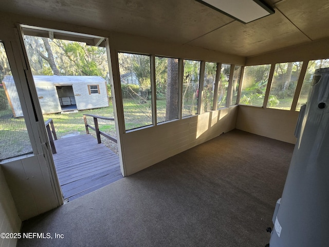 unfurnished sunroom with a wealth of natural light