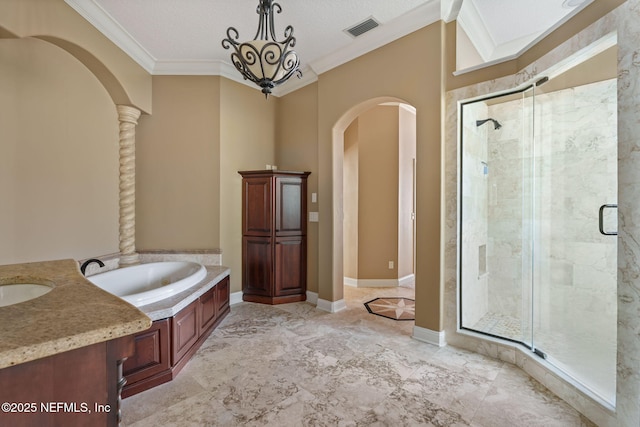 bathroom featuring crown molding, a sink, visible vents, a bath, and a stall shower