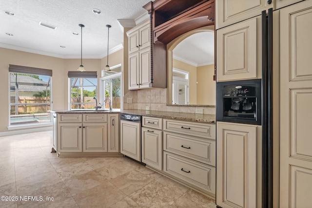 kitchen with cream cabinets, a sink, and paneled appliances