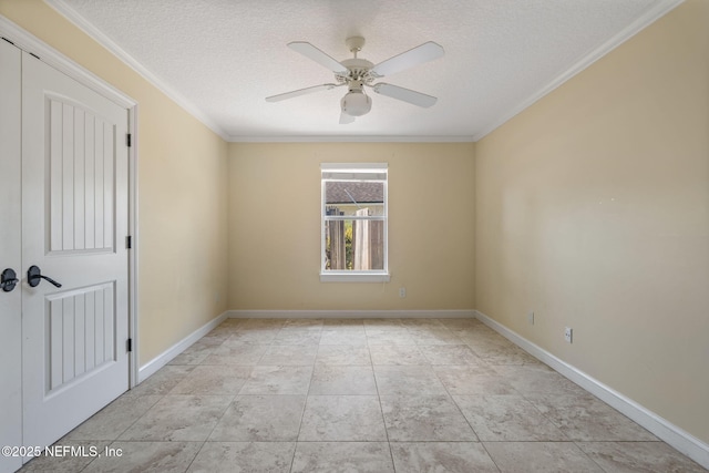 spare room featuring crown molding, a ceiling fan, a textured ceiling, and baseboards