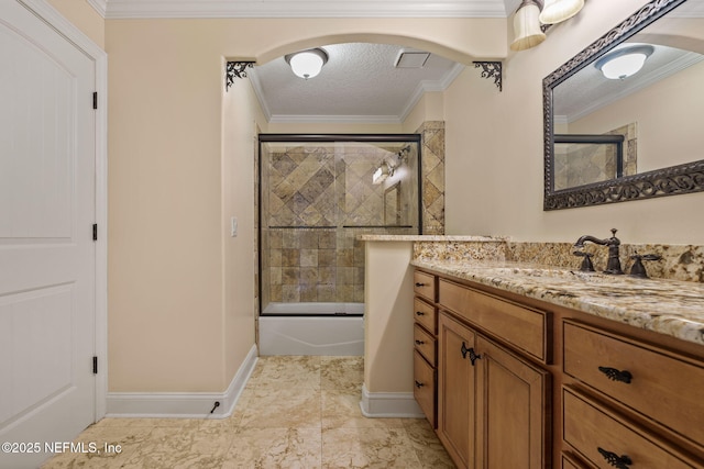 full bath with vanity, baseboards, ornamental molding, and combined bath / shower with glass door