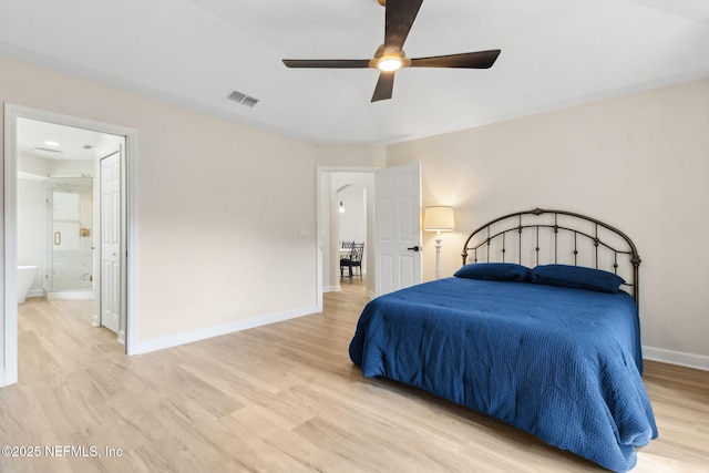 bedroom featuring ceiling fan, baseboards, ensuite bathroom, light wood-type flooring, and visible vents