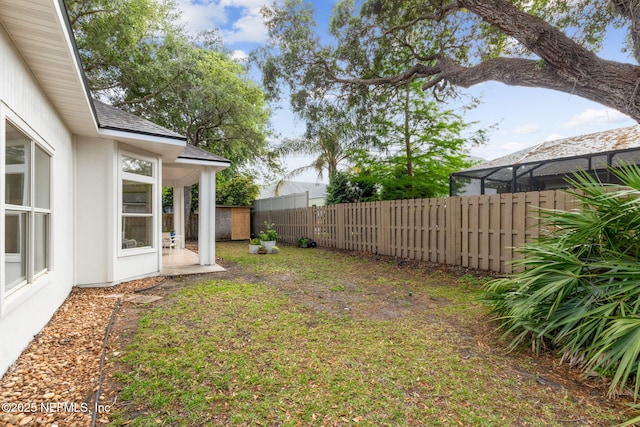 view of yard featuring a fenced backyard