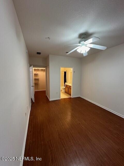 6860 Skaff Ave Unit 2-6, Jacksonville, FL 32244 - unfurnished room featuring a ceiling fan, visible vents, wood finished floors, and baseboards