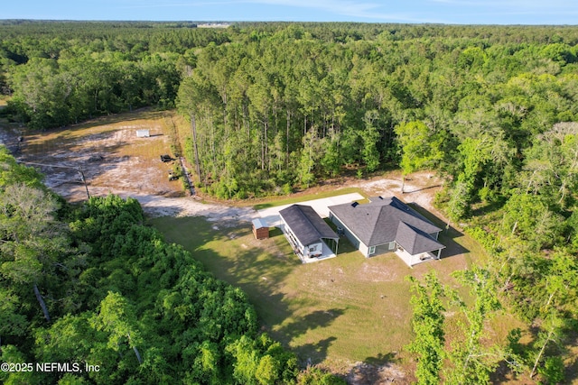 drone / aerial view with a forest view
