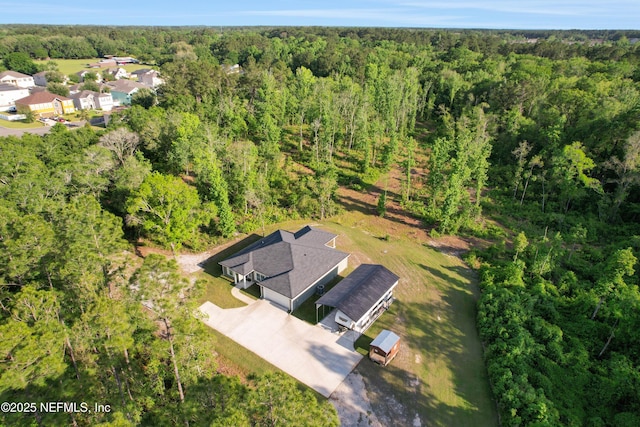 aerial view featuring a forest view