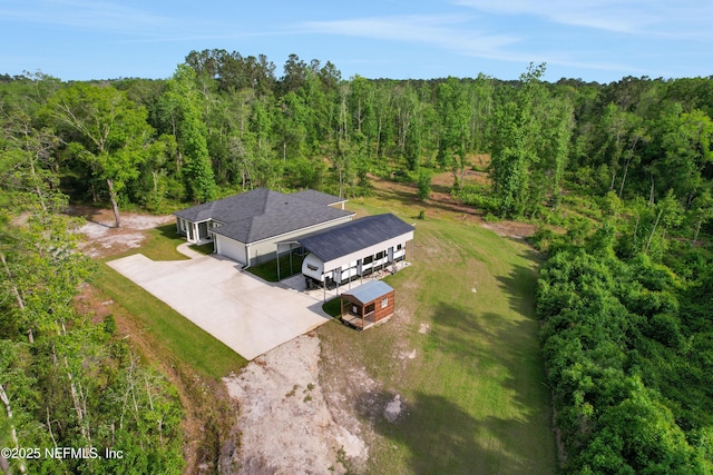 bird's eye view with a forest view