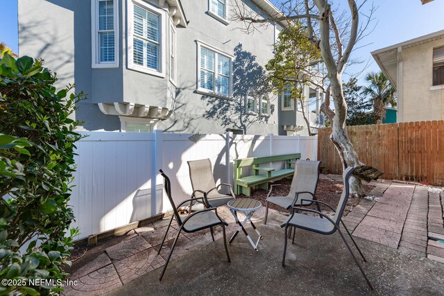 1711 2nd St N, Jacksonville Beach, FL 32250 - view of patio with a fenced backyard