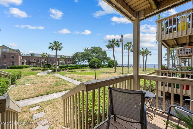 830 Cedar St Unit 830, Jacksonville, FL 32207 - wooden terrace featuring a residential view, a water view, and a yard