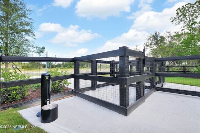 wooden deck with an outdoor structure and exterior structure