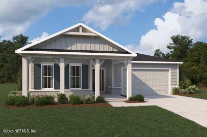 view of front of property featuring an attached garage, concrete driveway, a porch, and a front yard