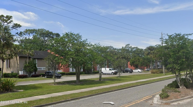 view of street featuring curbs and sidewalks