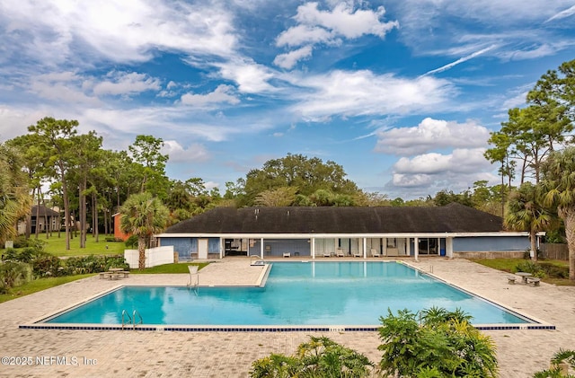 community pool with a patio