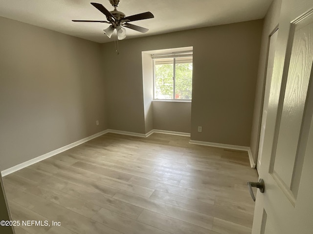 unfurnished bedroom featuring baseboards, a ceiling fan, and light wood finished floors