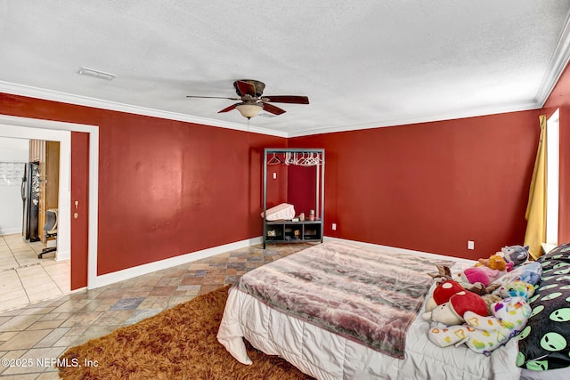 bedroom with a textured ceiling, a ceiling fan, baseboards, visible vents, and ornamental molding