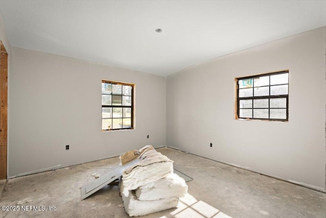 spare room featuring a wealth of natural light