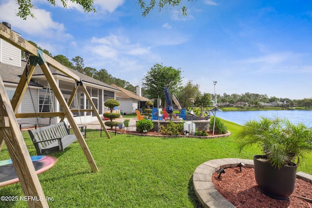 view of yard with a water view