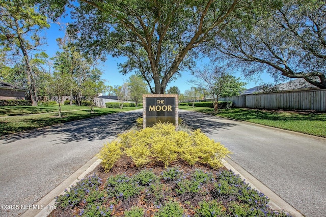 view of road featuring curbs