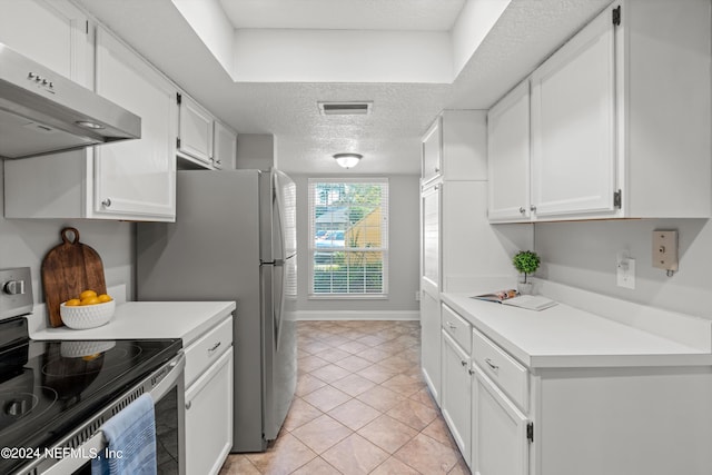 kitchen featuring stainless steel range with electric cooktop, under cabinet range hood, white cabinets, light countertops, and a textured ceiling