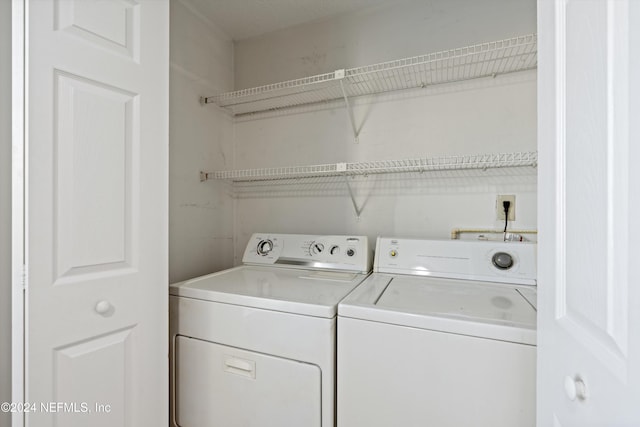 laundry room featuring washer and dryer