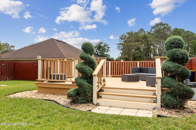 deck with fence, a yard, and outdoor lounge area