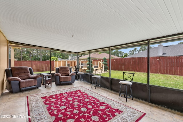 sunroom with outdoor lounge area