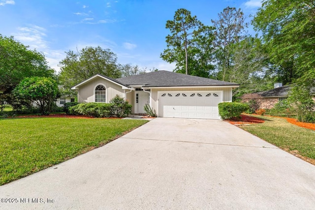 11598 Lazy Willow Ln, Jacksonville, FL 32223 - single story home featuring an attached garage, driveway, and a front lawn