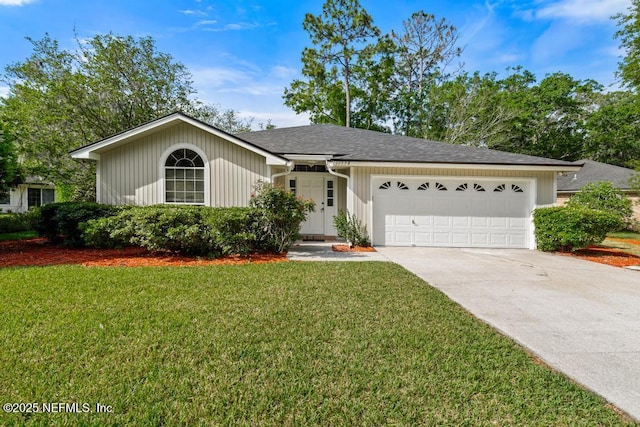 11598 Lazy Willow Ln, Jacksonville, FL 32223 - single story home featuring a garage, concrete driveway, a front lawn, and a shingled roof