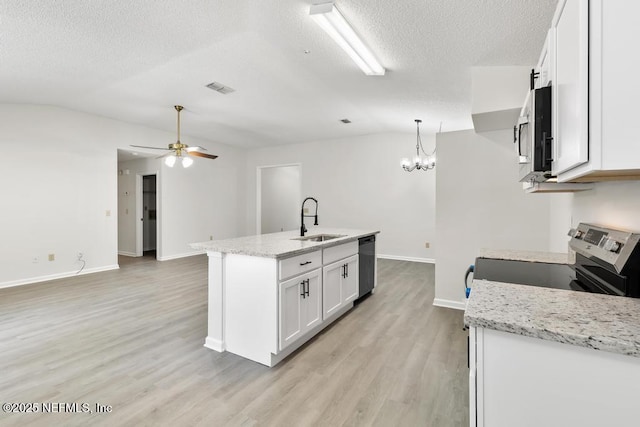 11598 Lazy Willow Ln, Jacksonville, FL 32223 - kitchen with a sink, stainless steel appliances, lofted ceiling, white cabinets, and light wood-type flooring
