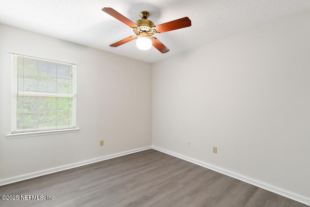 11598 Lazy Willow Ln, Jacksonville, FL 32223 - empty room featuring wood finished floors, a ceiling fan, and baseboards