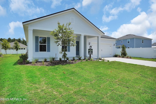 440 Slash Pine Pl, Yulee, FL 32097 - view of front of property featuring concrete driveway, a garage, and covered porch