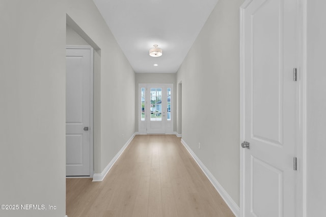 440 Slash Pine Pl, Yulee, FL 32097 - hall with light wood-style flooring and baseboards