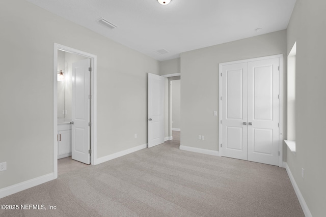 440 Slash Pine Pl, Yulee, FL 32097 - unfurnished bedroom with a closet, carpet floors, and baseboards
