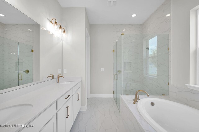 440 Slash Pine Pl, Yulee, FL 32097 - full bath featuring marble tiled floors, a bath, a marble finish shower, recessed lighting, and double vanity