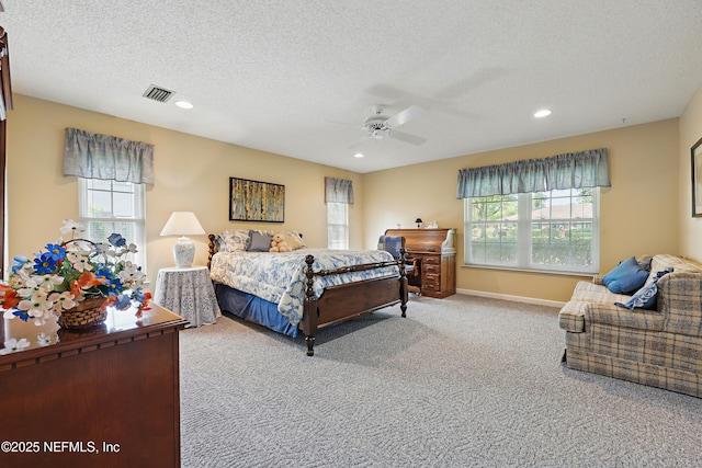 7805 Hunters Grove Rd, Jacksonville, FL 32256 - bedroom with carpet floors, recessed lighting, ceiling fan, and visible vents