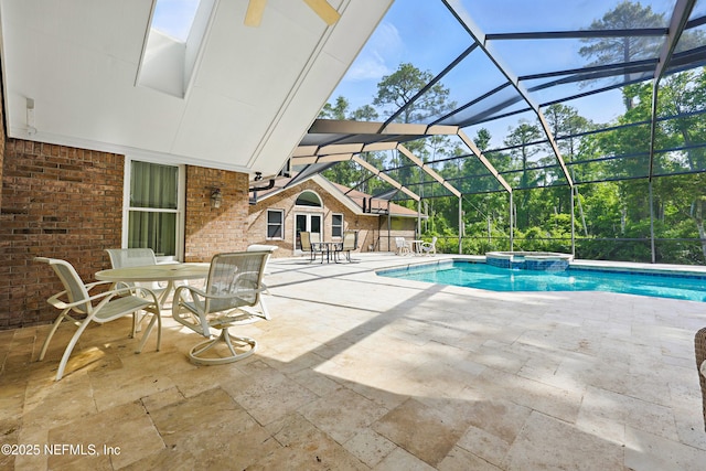 7805 Hunters Grove Rd, Jacksonville, FL 32256 - view of swimming pool with a patio, a pool with connected hot tub, and a lanai