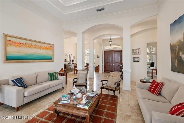 408 Osprey Lookout Ct Unit 29, Ponte Vedra Beach, FL 32082 - living area with arched walkways, decorative columns, ornamental molding, stone tile flooring, and baseboards