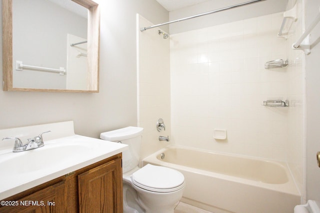 bathroom with shower / bath combination, vanity, and toilet
