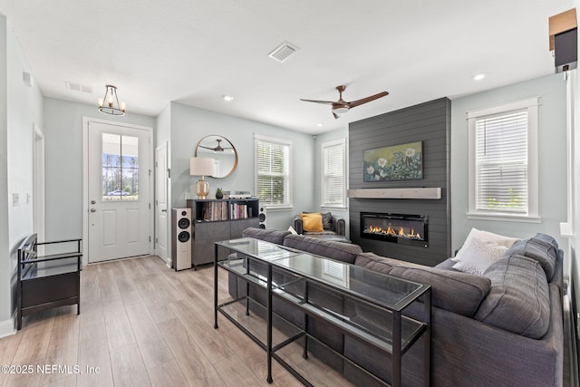 109 Redbud Ln, Yulee, FL 32097 - living room featuring visible vents, a wealth of natural light, and light wood-style flooring