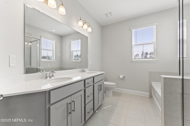 109 Redbud Ln, Yulee, FL 32097 - full bath with double vanity, a sink, baseboards, and tile patterned floors